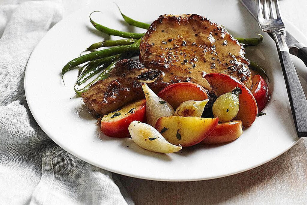 Pork Chops with Apples, Sweet Potatoes, and Sauerkraut